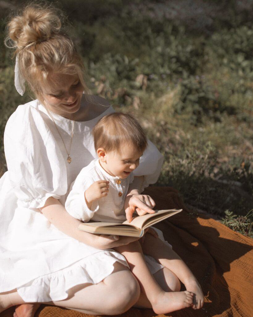 Photo-of-woman-and-child-reading-a-book