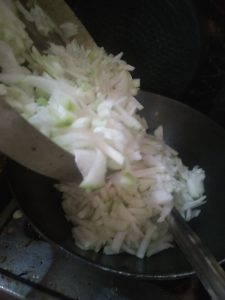 Chopped Chalkumro being added in the kadhai