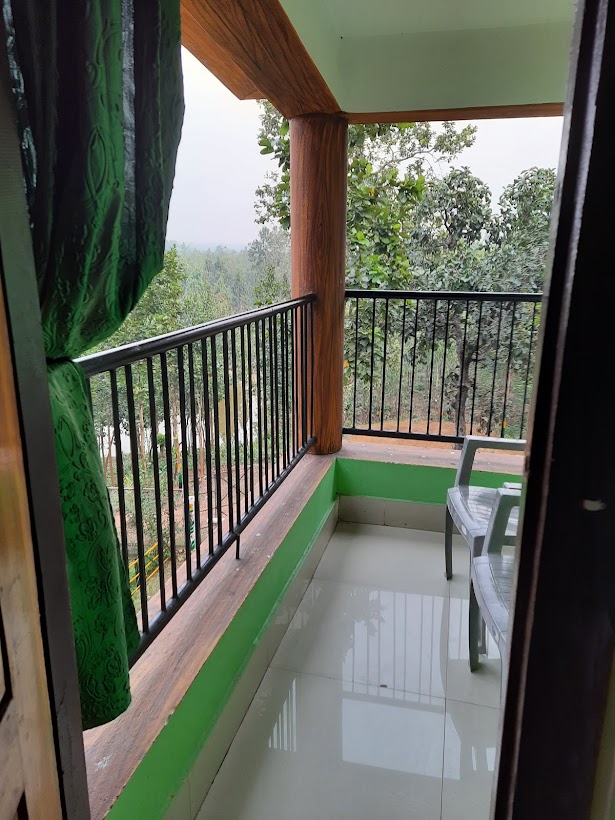 Rimil eco tourism treehouse room back balcony